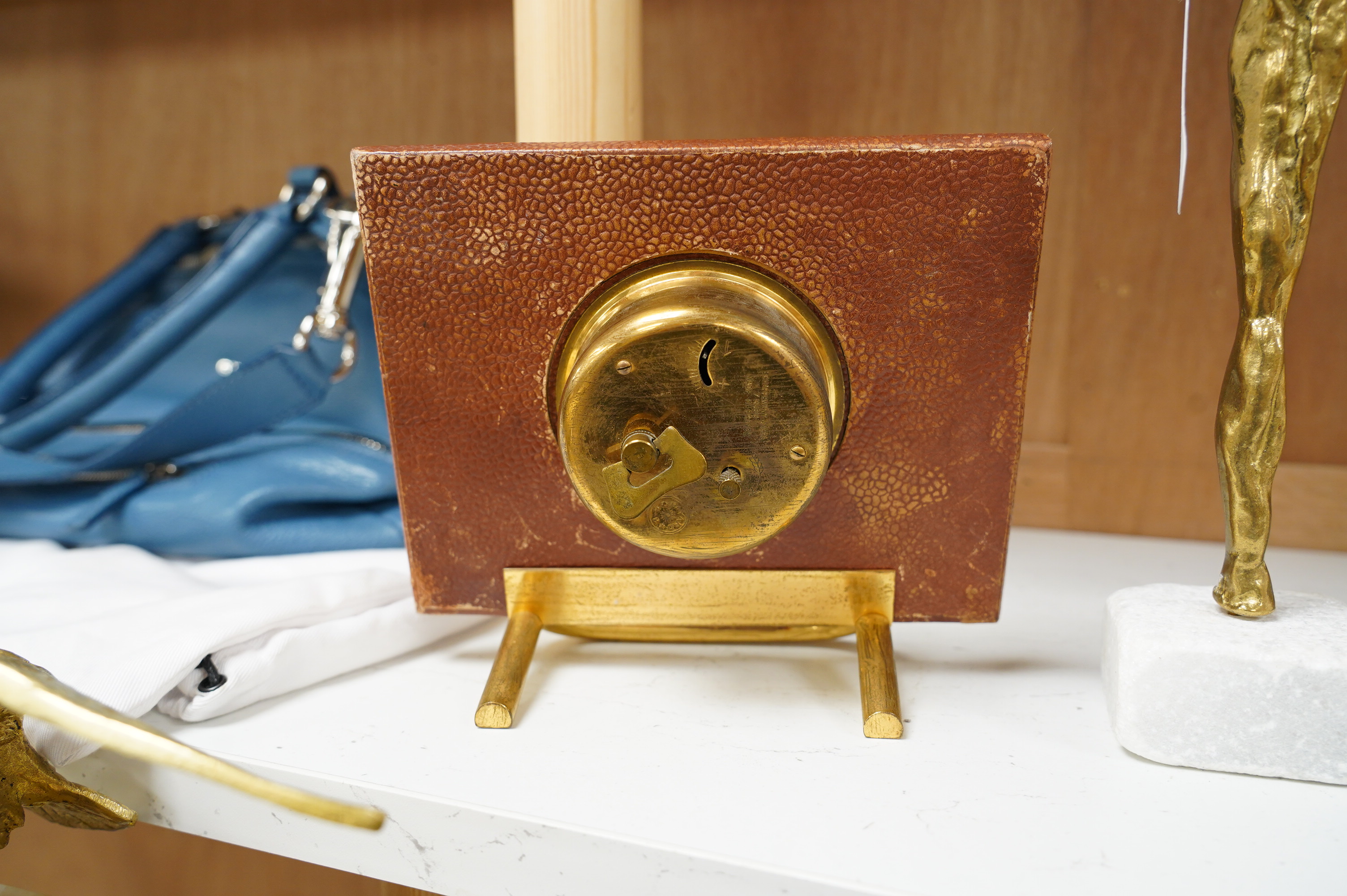 A leather Hermes style Bayard clock in a faux shagreen patina